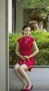 Chinese cheongsam model in Chinese classical garden